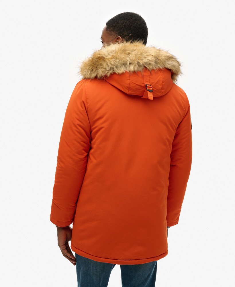 everest parka met capuchon van imitatiebont in de kleur gepureerde pompoen.
