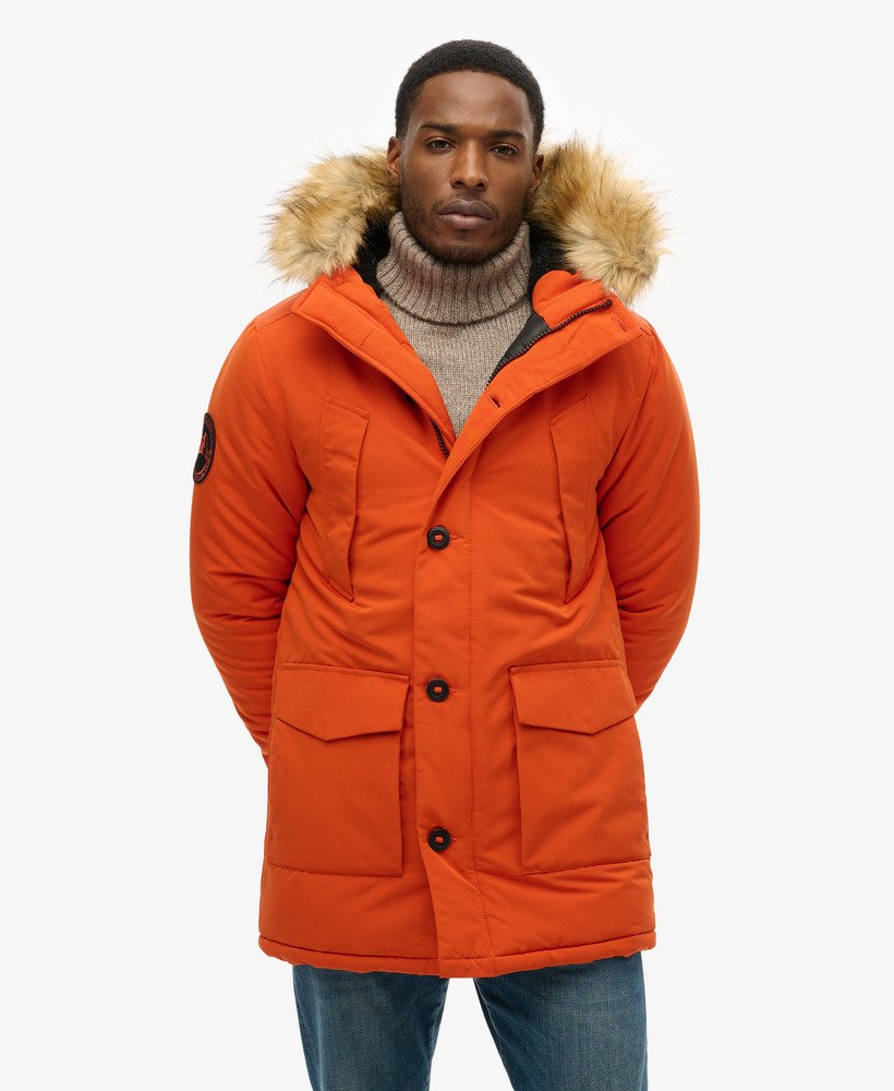 everest parka met capuchon van imitatiebont in de kleur gepureerde pompoen.