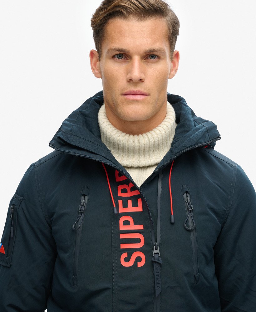 ultieme sd-windjack in eclipse navybold orange