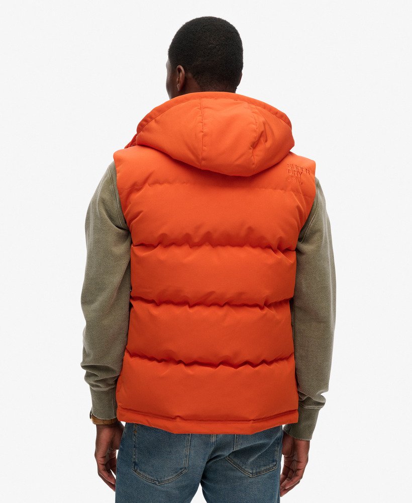everest gewatteerd vest met capuchon in gepureerde pompoen-sinaasappelkleur
