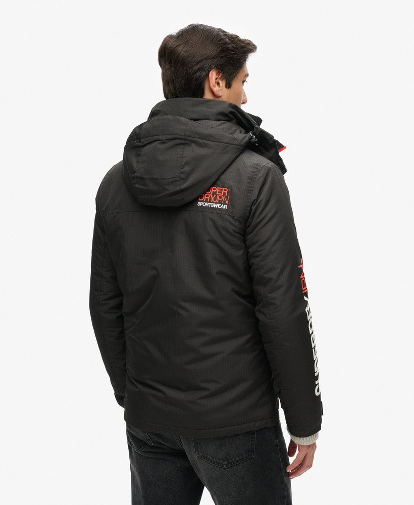 windjack met capuchon in jachtstijl zwartfel oranje.