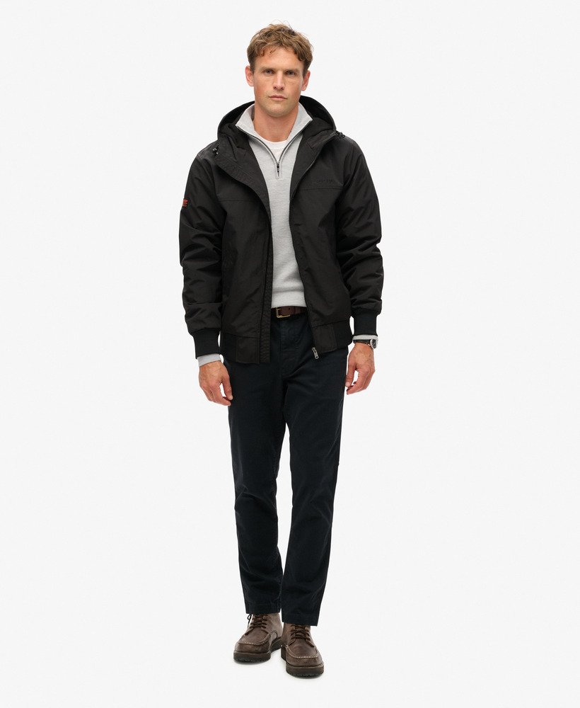 overgebleven nylon bomberjack met capuchon in gitzwart.