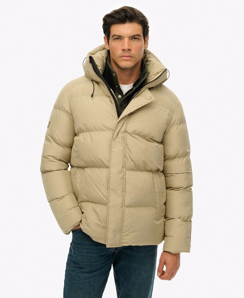 Sportieve pufferjas met capuchon, middellang model