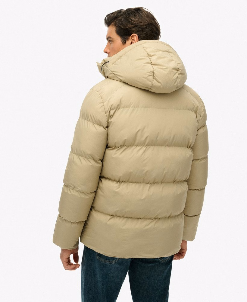 Sportieve pufferjas met capuchon, middellang model