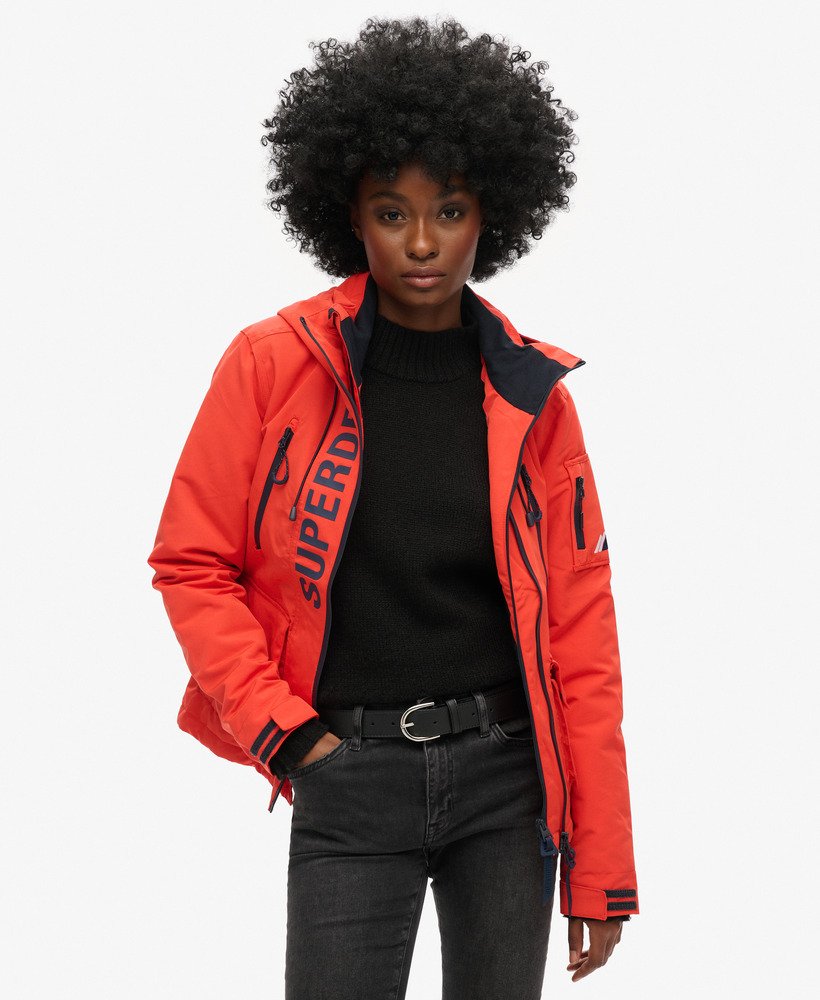 capuchonjack ultimate sd-windcheater in opvallend oranjediepblauw
