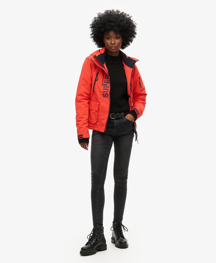 capuchonjack ultimate sd-windcheater in opvallend oranjediepblauw