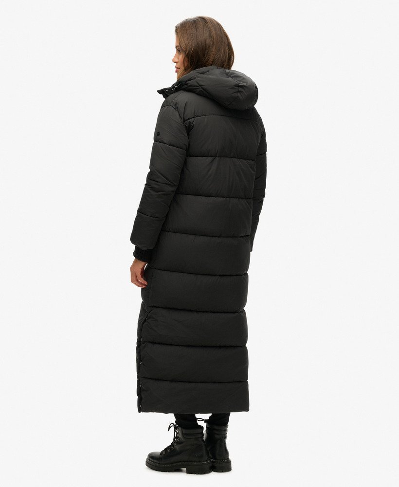 maxi-pufferjas met capuchon in zwart