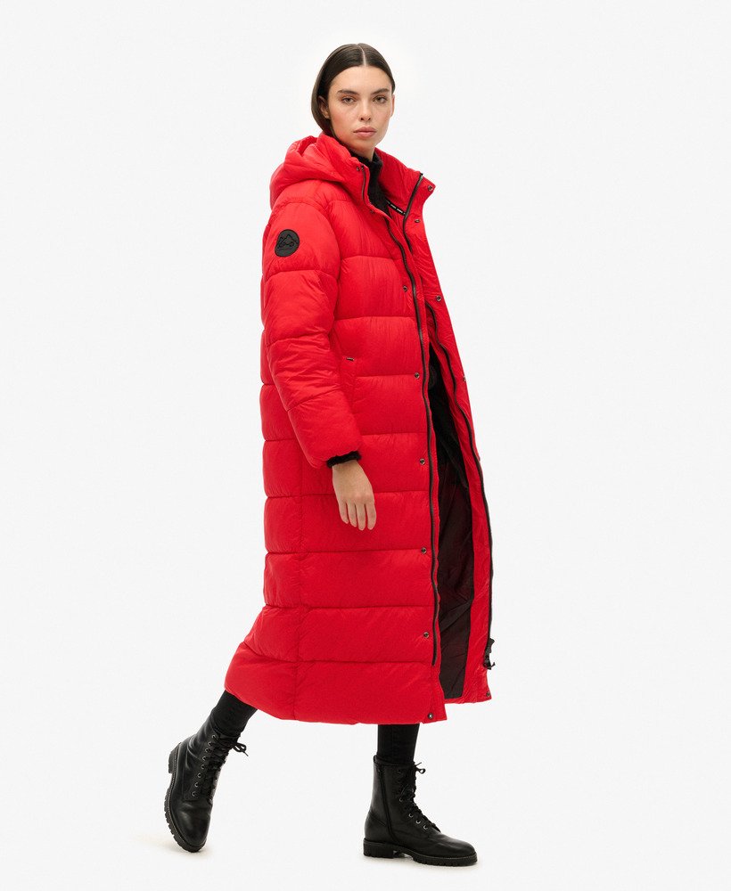 cocoon longline puffer coat in high risk red