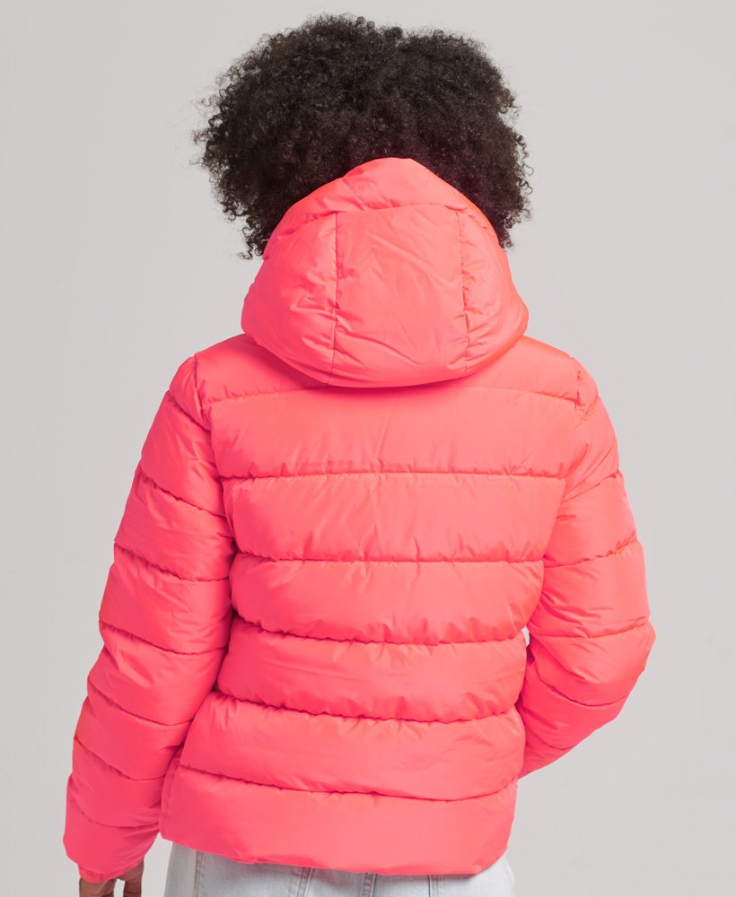 spirit sports pufferjack met capuchon in hyper fire coral