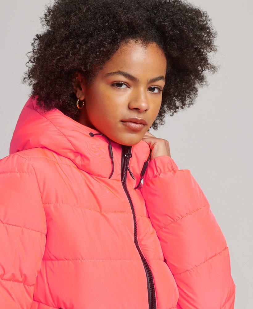 spirit sports pufferjack met capuchon in hyper fire coral