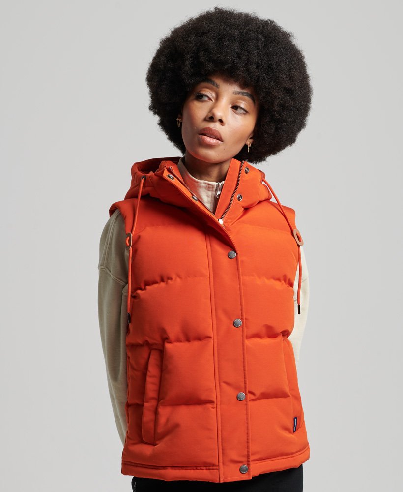 vintage everest-gilet met capuchon in pompoenpuree-sinaasappelkleur.