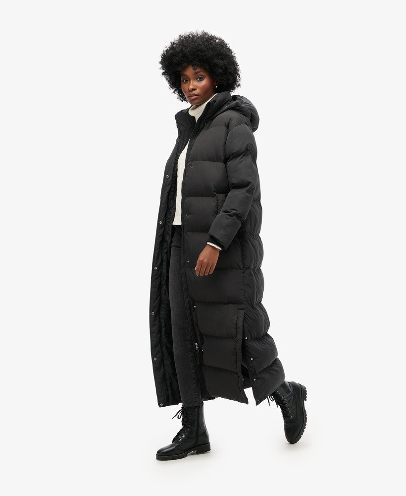 maxi pufferjas met capuchon in zwart