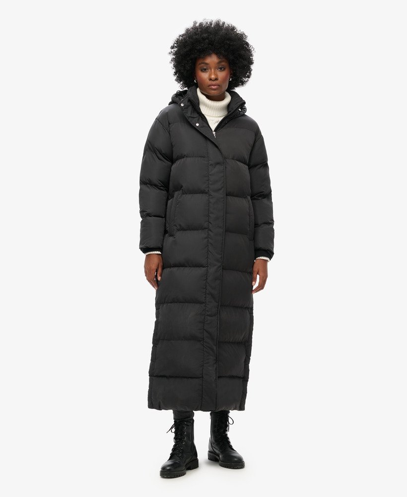 maxi pufferjas met capuchon in zwart