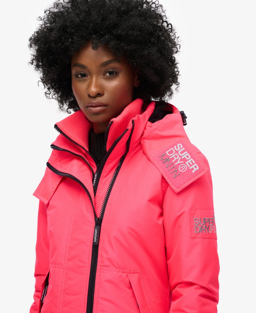 windjack met capuchon in hyper fire pink
