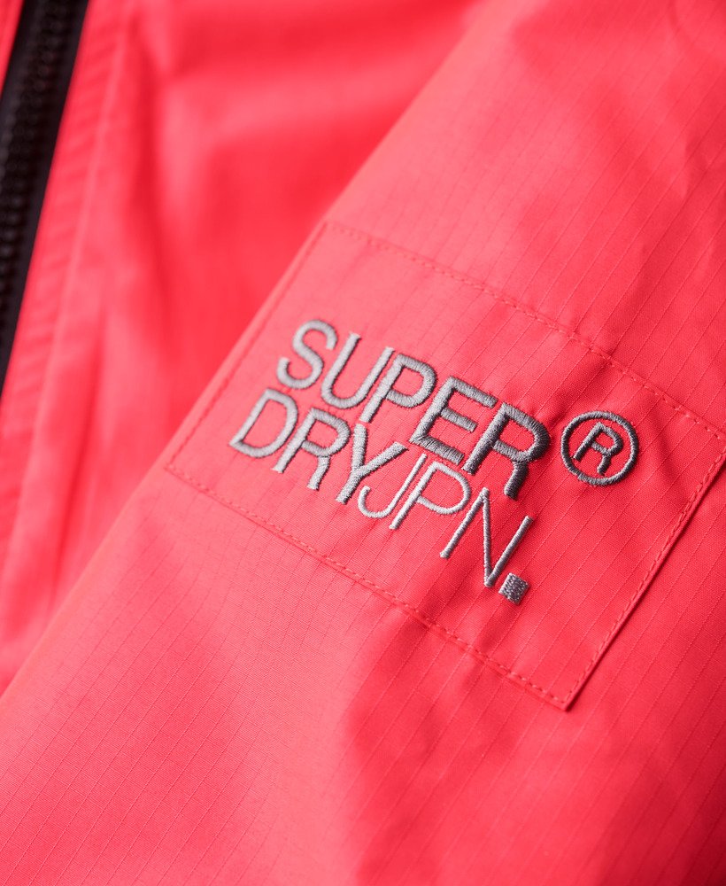 windjack met capuchon in hyper fire pink