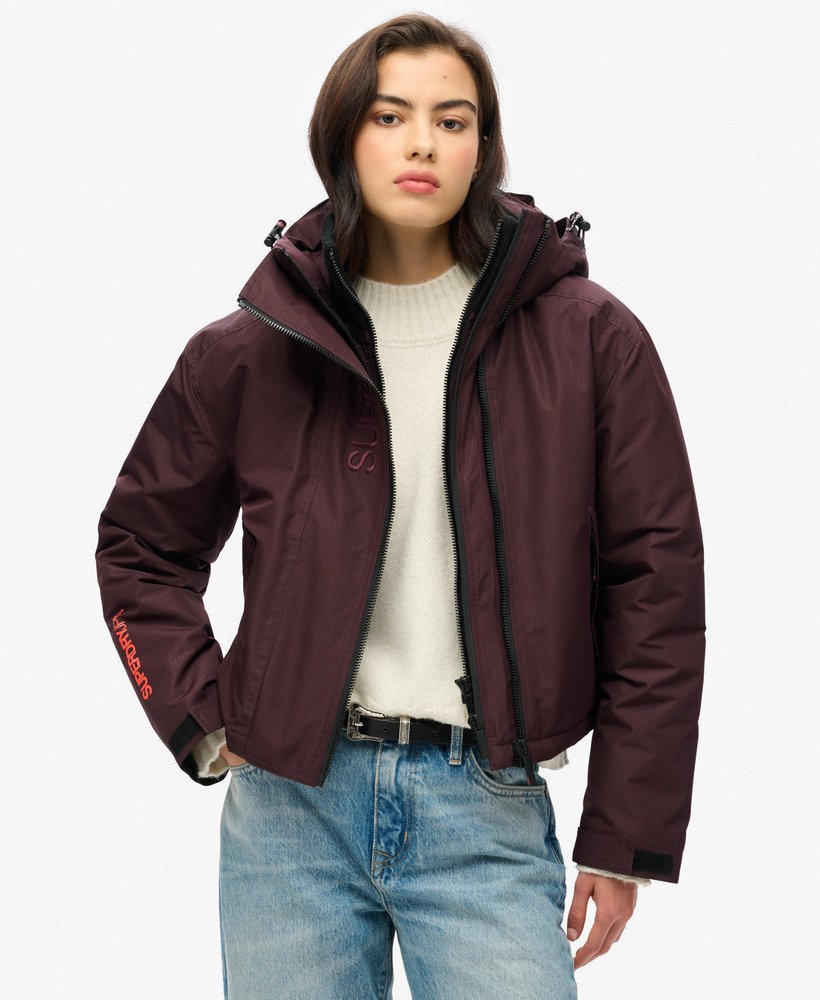 geborduurde windbreaker met capuchon in rokerig auberginepaars
