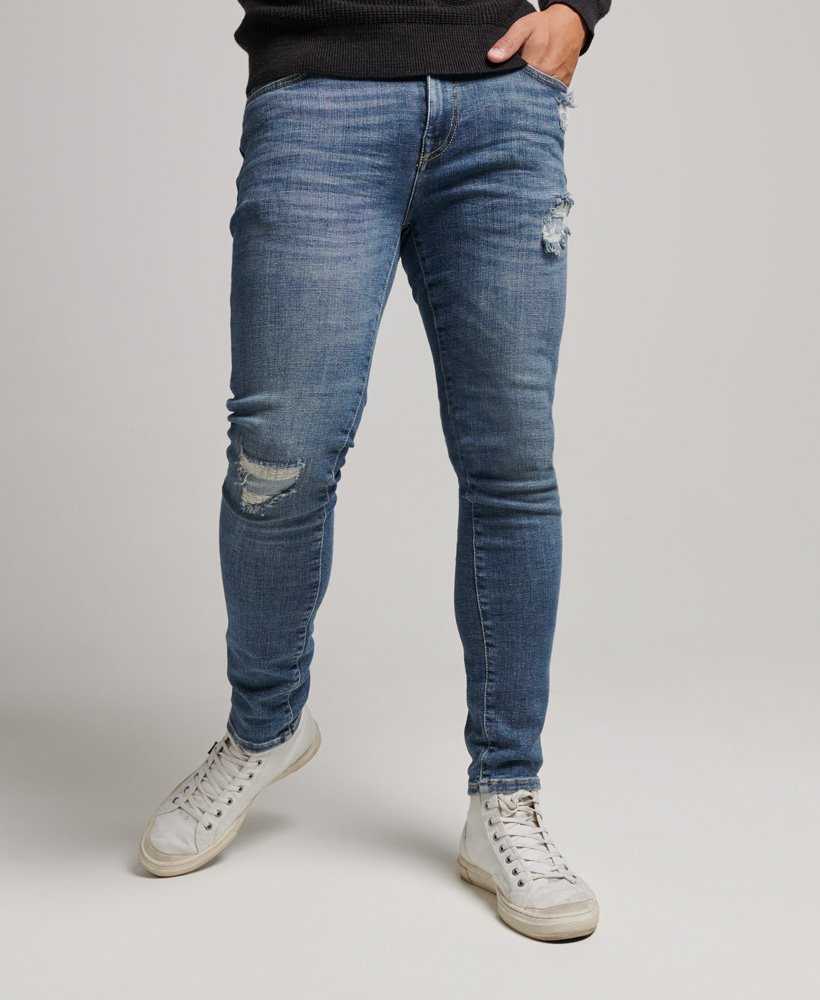 vintage skinny jeans in stanton bright blue rip