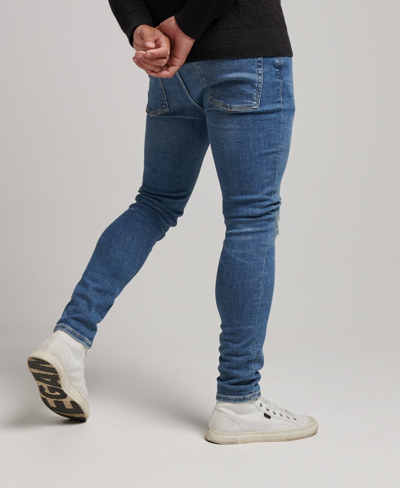 vintage skinny jeans in stanton bright blue rip
