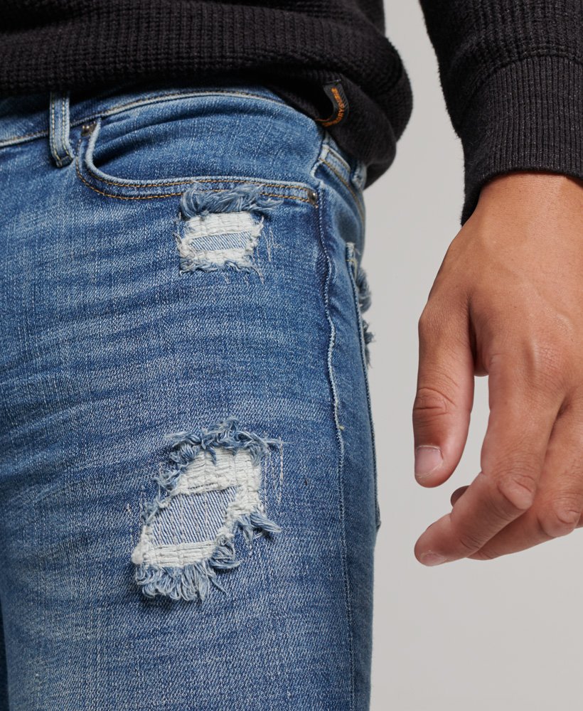 vintage skinny jeans in stanton bright blue rip