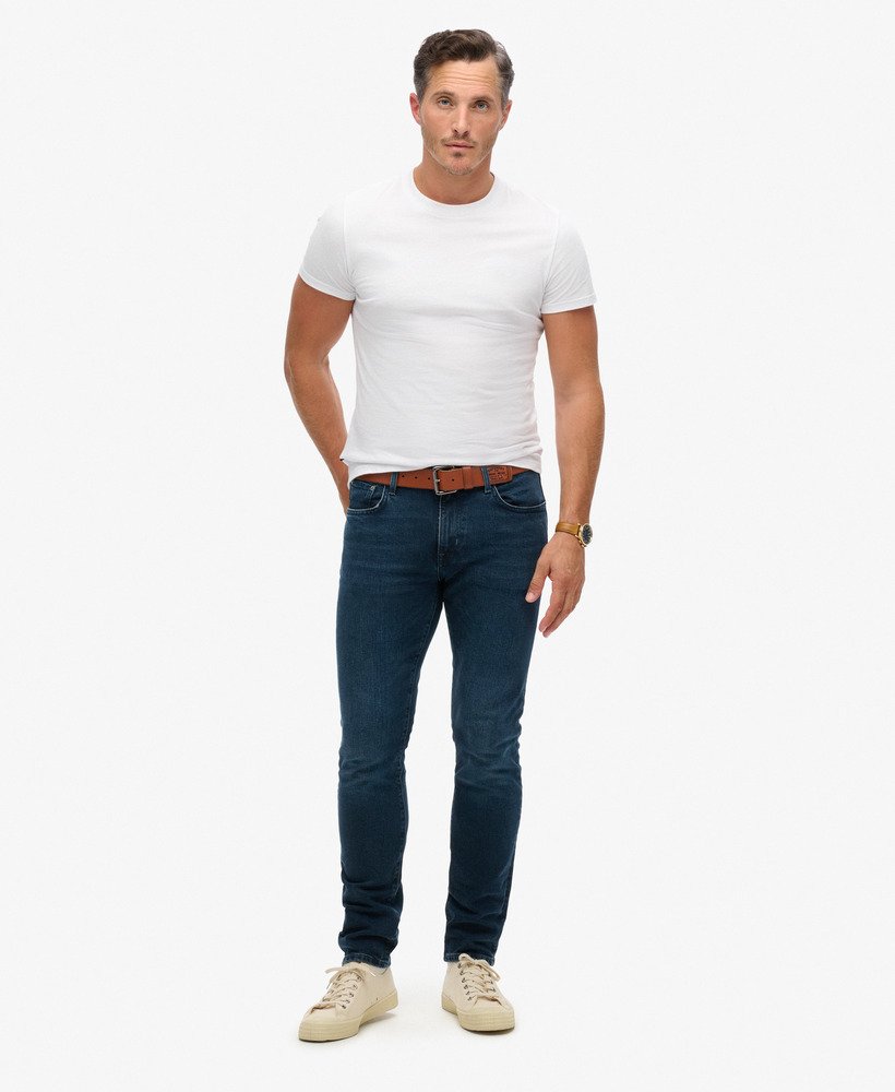 vintage slim fit jeans in vanderbilt ink gedragen.