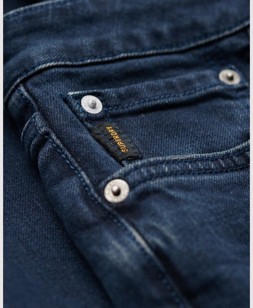 vintage slim fit jeans in vanderbilt ink gedragen.