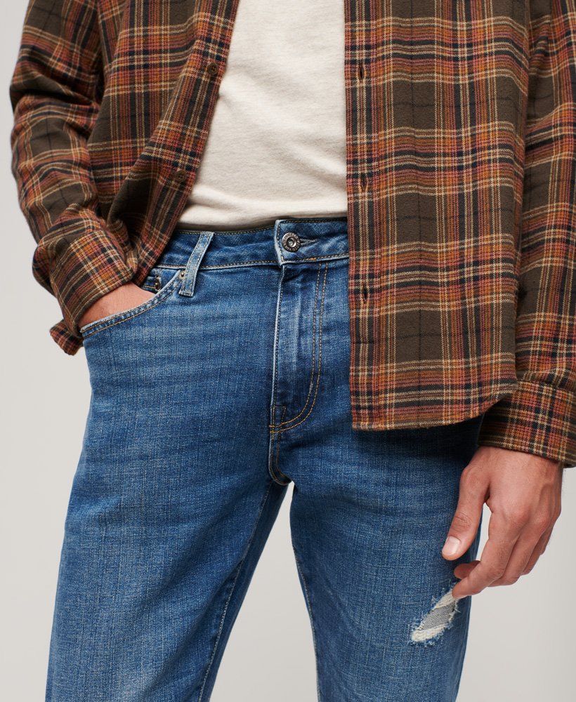 vintage slim fit jeans in stanton bright blue rip