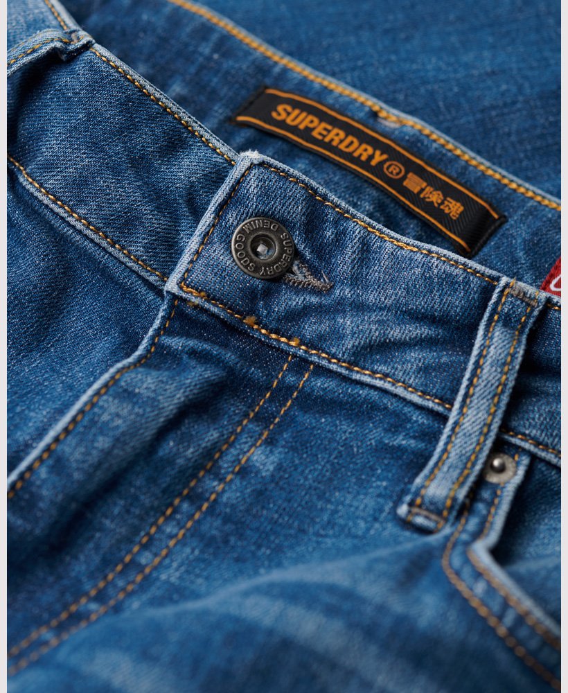 vintage slim fit jeans in stanton bright blue rip