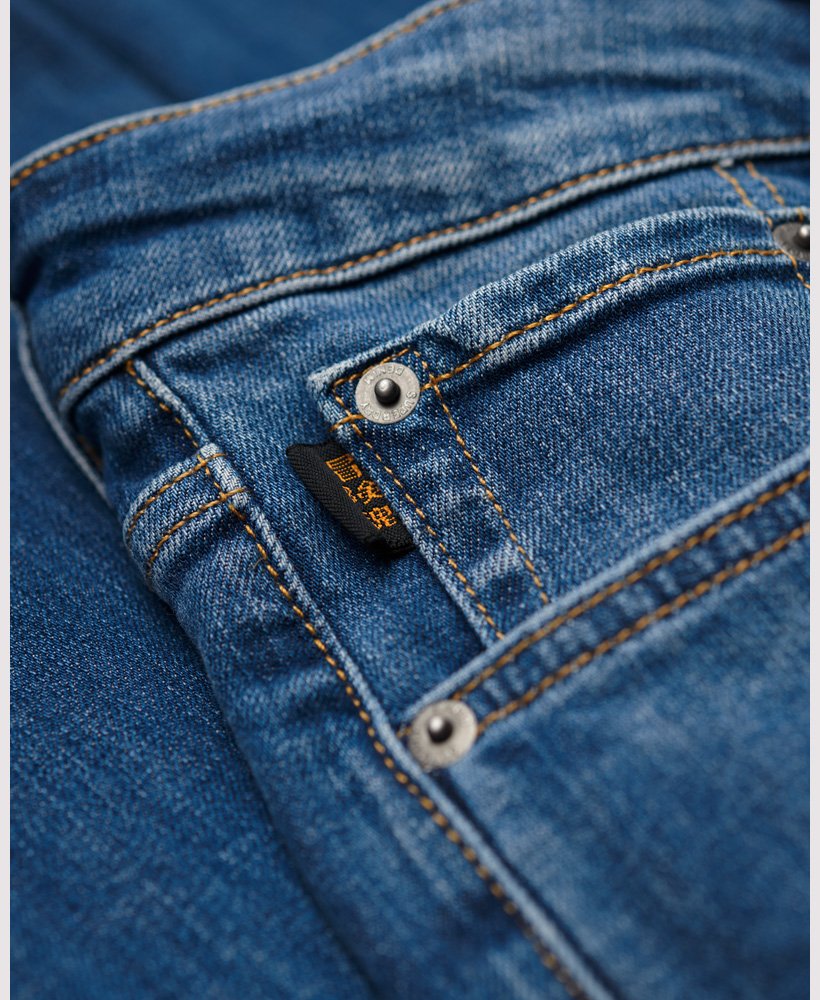 vintage slim fit jeans in stanton bright blue rip
