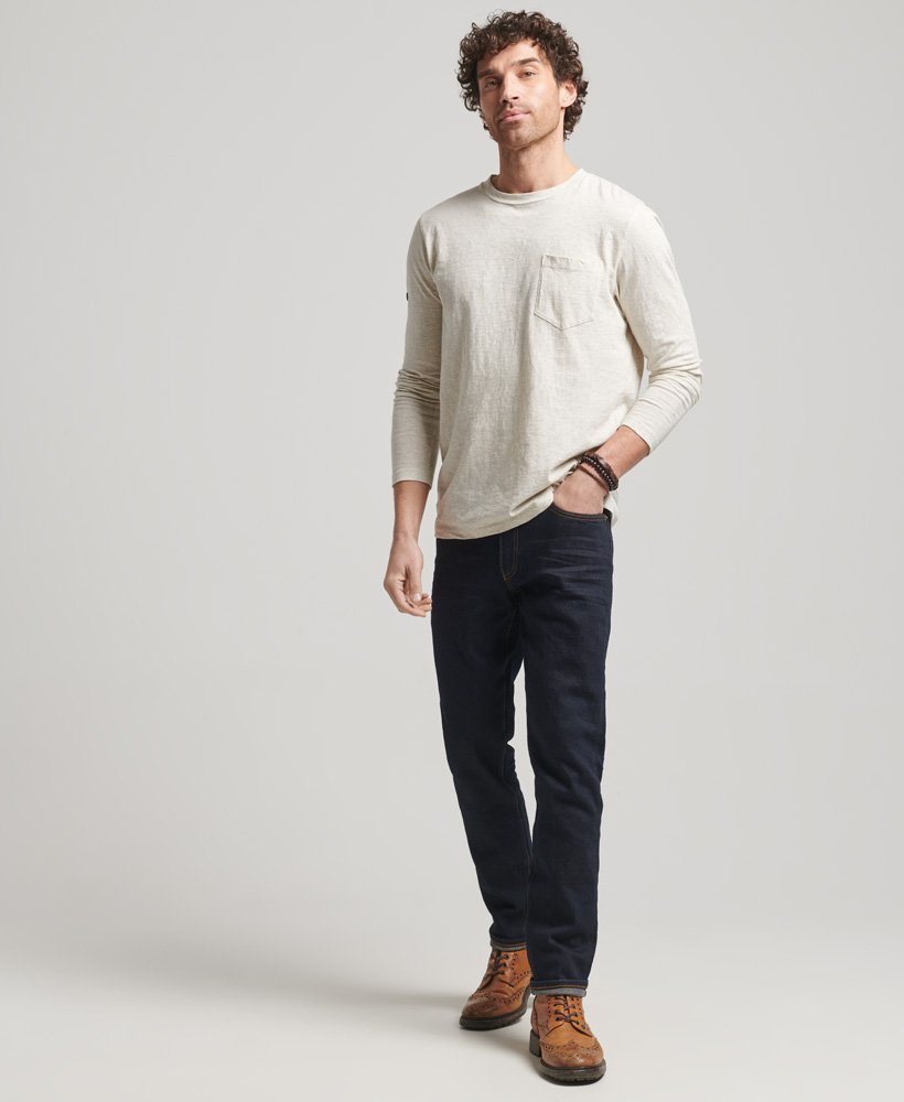 the merchant store - biologische slim fit jeans in donkerblauw met selvedge-afwerking