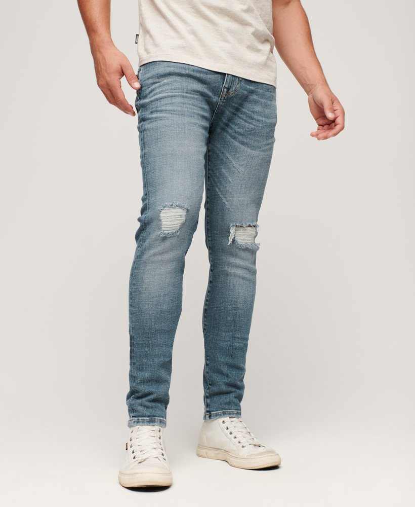 vintage skinny jeans in columbia blue met scheuren