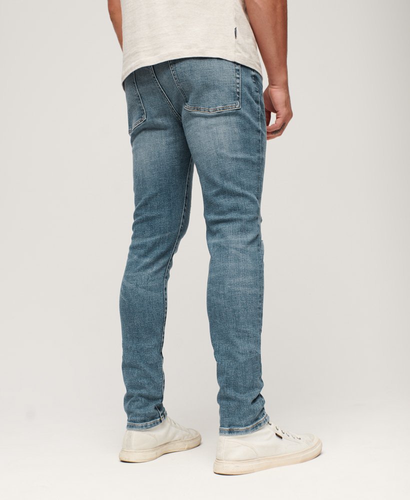 vintage skinny jeans in columbia blue met scheuren
