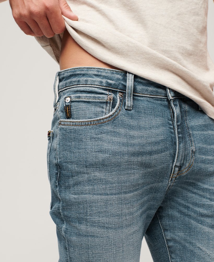 vintage skinny jeans in columbia blue met scheuren