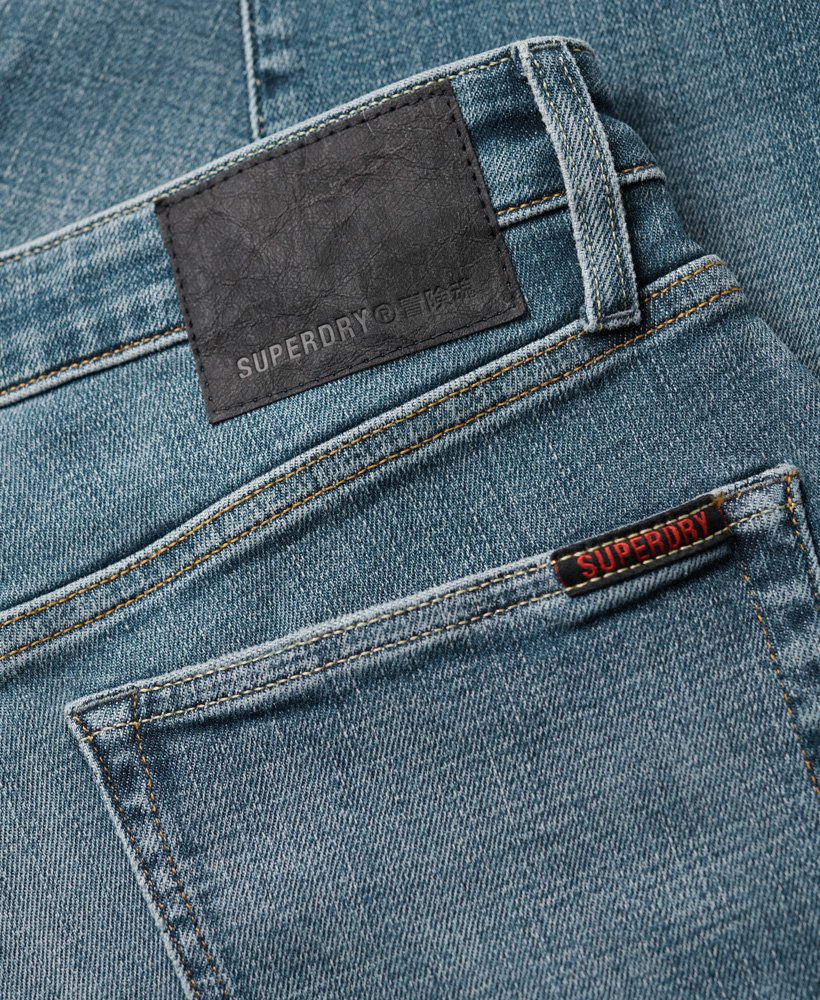 vintage skinny jeans in columbia blue met scheuren