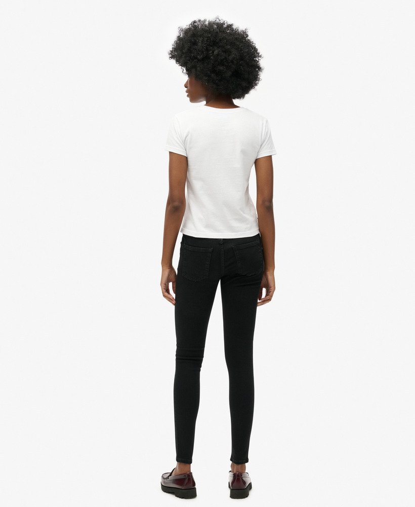 vintage skinny jeans met middelhoge taille van biologisch katoen in zwarte wassing.