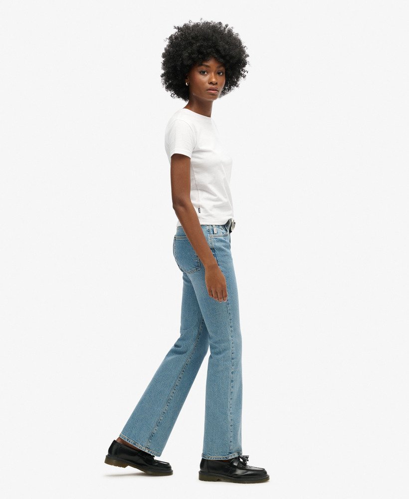 vintage mid-rise slim flare jeans in donker indigo verouderd.
