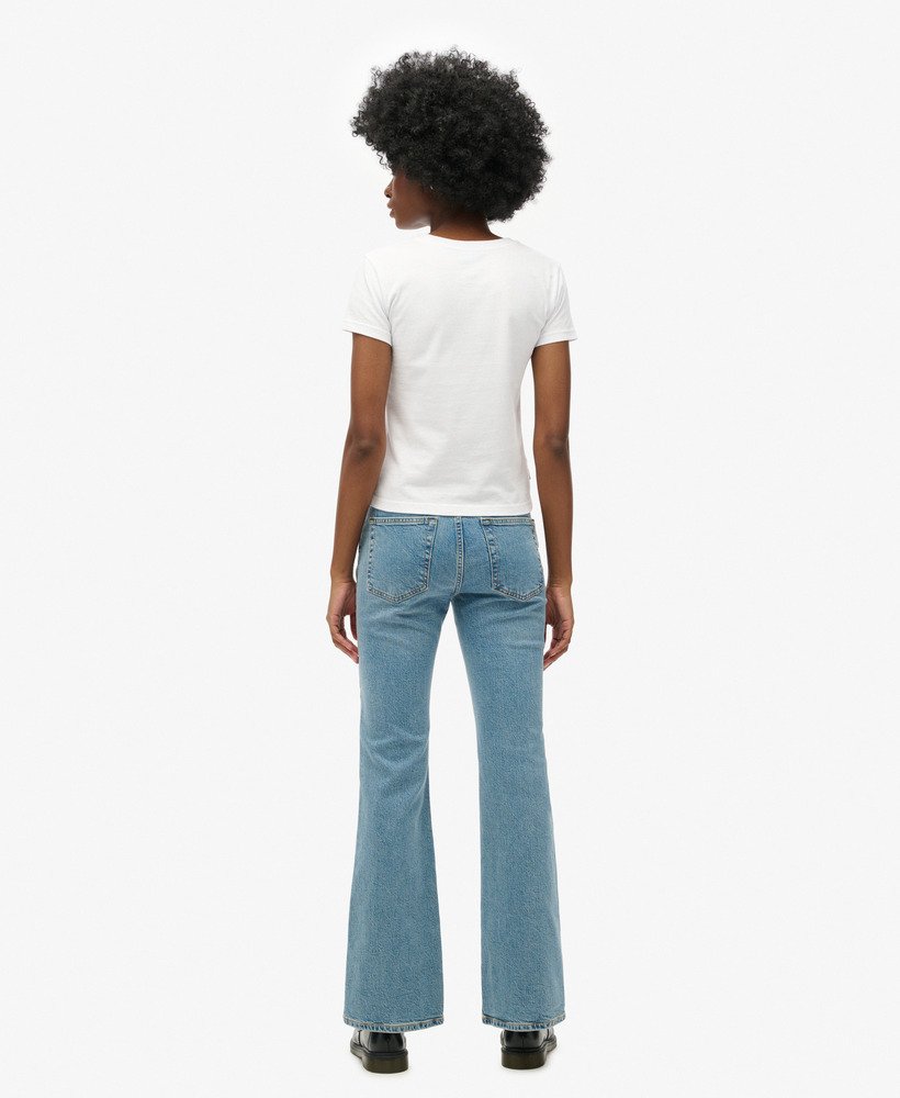vintage mid-rise slim flare jeans in donker indigo verouderd.
