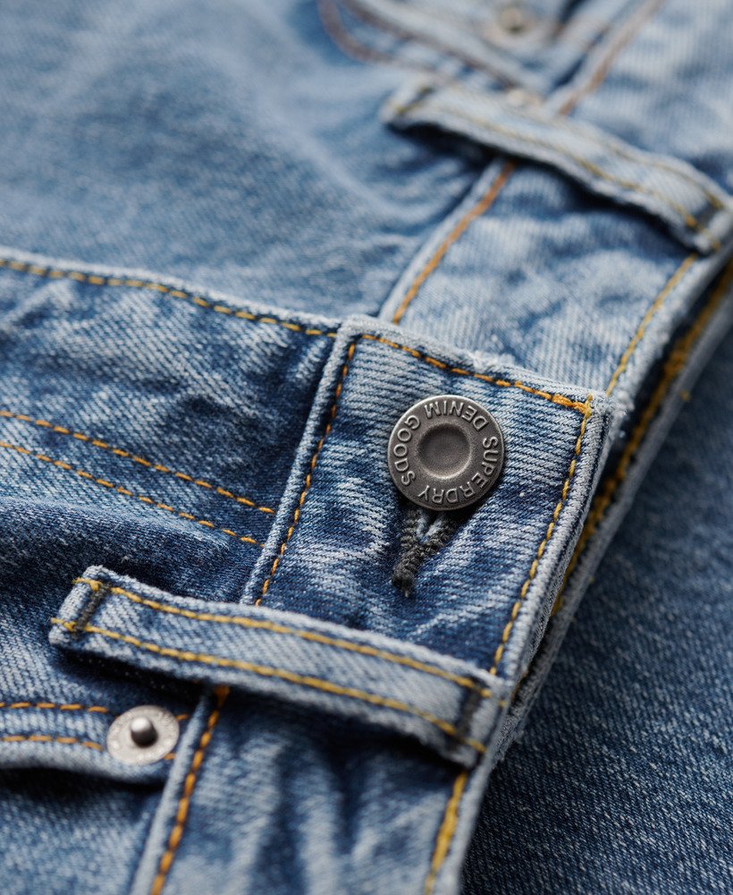 vintage mid-rise slim flare jeans in donker indigo verouderd.
