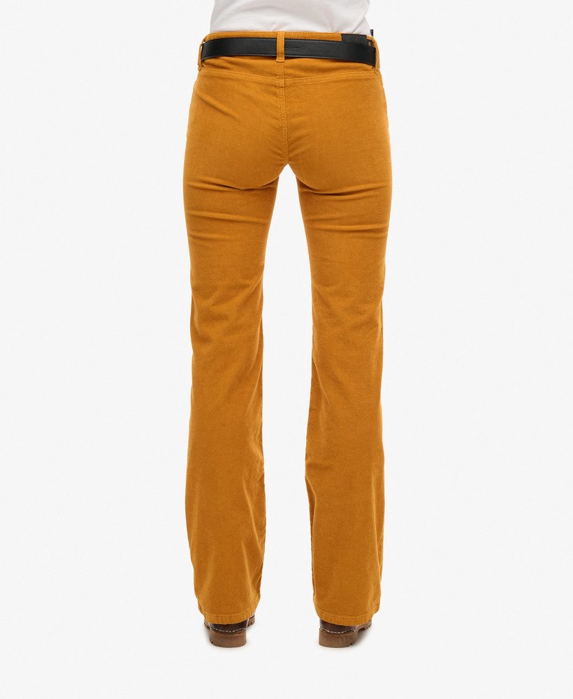laag uitlopende corduroy jeans met tailleband in pompoenkruidbruin