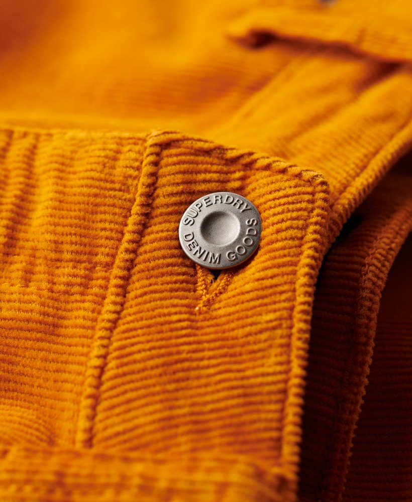 laag uitlopende corduroy jeans met tailleband in pompoenkruidbruin