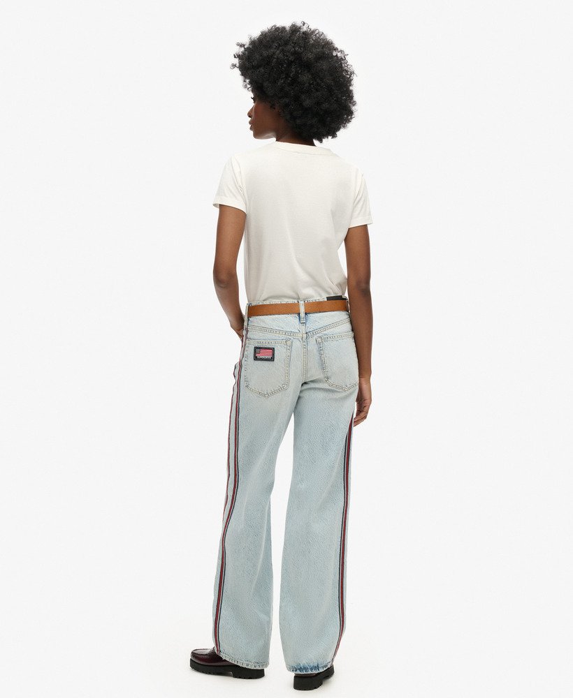 mid-rise jeans met wijde pijpen en dubbele bies in vintage lentestijl op maat gemaakt.