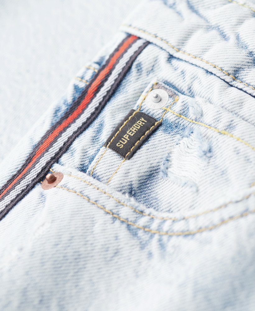 mid-rise jeans met wijde pijpen en dubbele bies in vintage lentestijl op maat gemaakt.