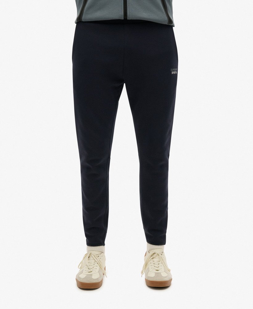 sport tech logo tapered joggers in eclipse navy