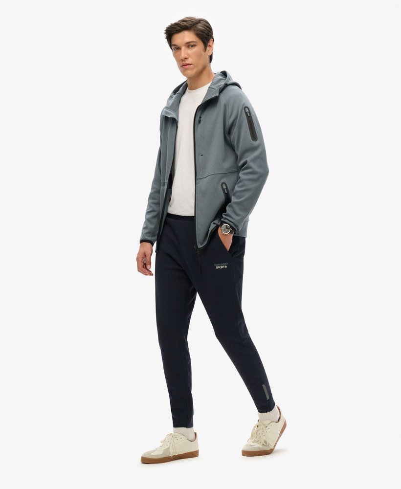 sport tech logo tapered joggers in eclipse navy