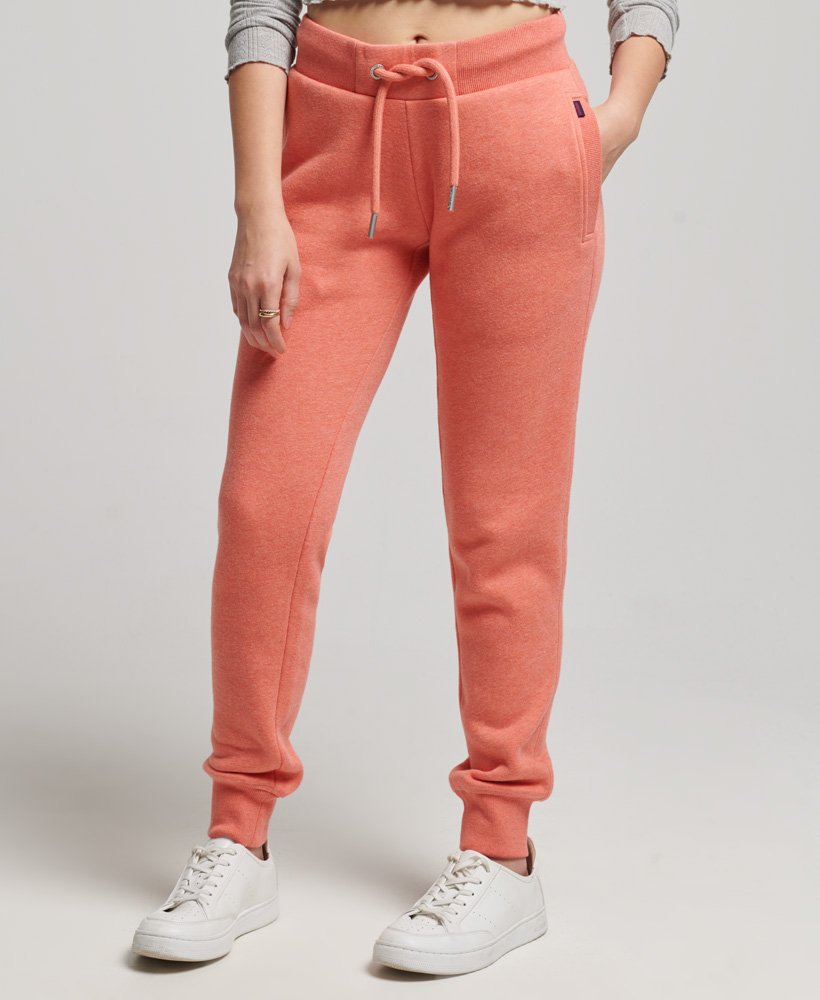 joggingbroek met essential logo van biologisch katoen in la coral marl