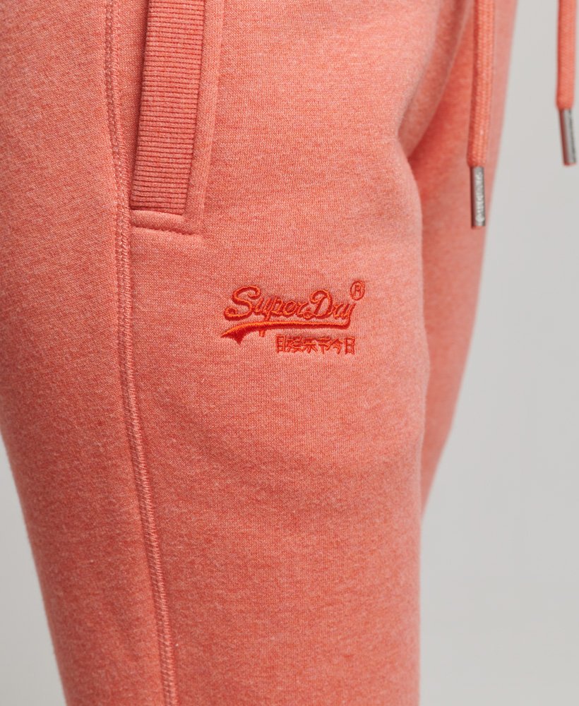 joggingbroek met essential logo van biologisch katoen in la coral marl