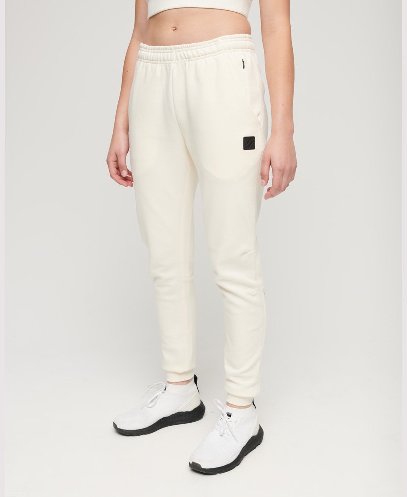 code tech slim joggers in rijstwit