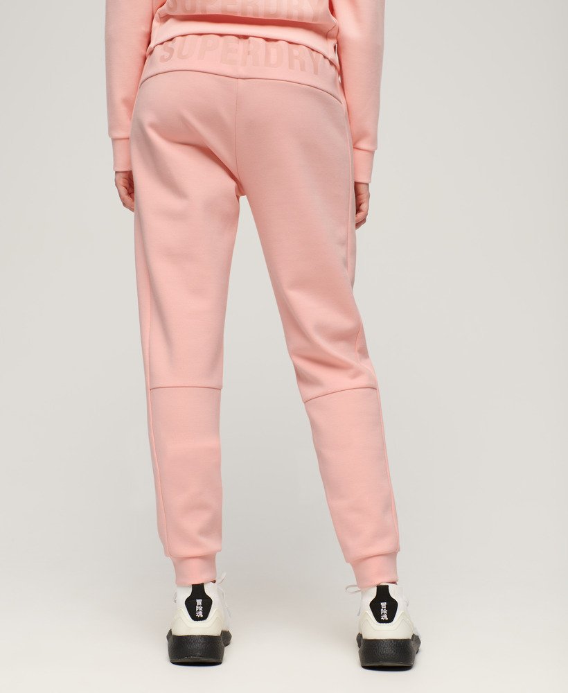 sports tech slim joggers in peach pearl pink