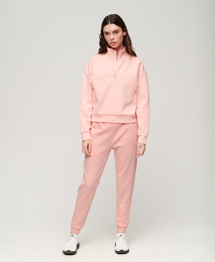 sports tech slim joggers in peach pearl pink