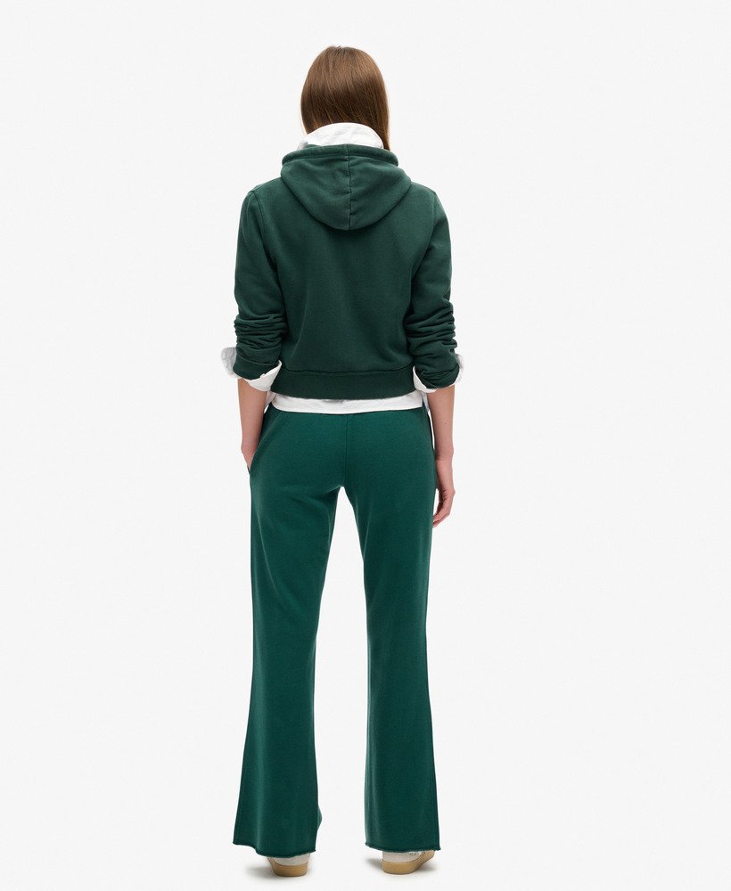 athletic essentials low rise flare joggers in dark pine green