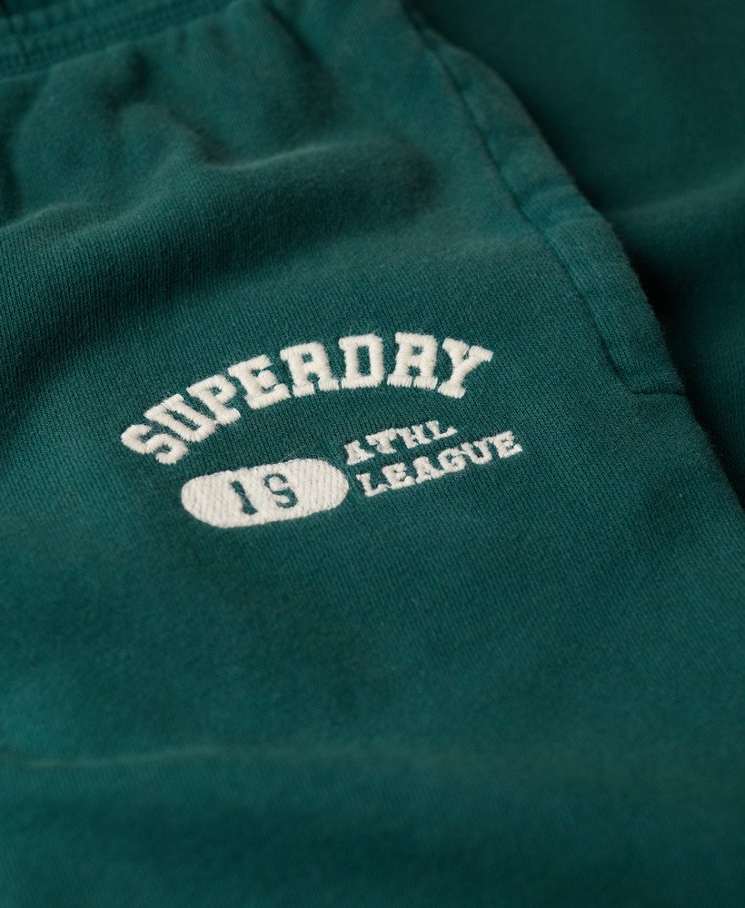 athletic essentials low rise flare joggers in dark pine green
